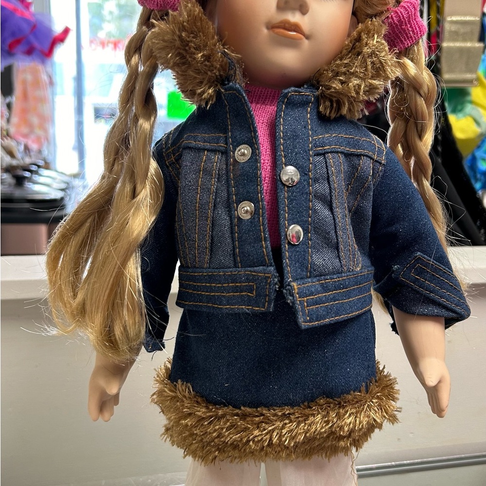 Genuine fine bisque porcelain doll.